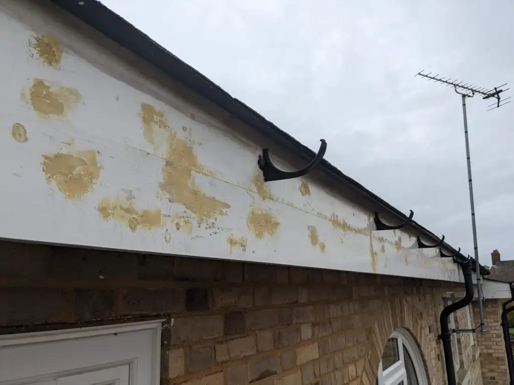 fascia being sanded and treated