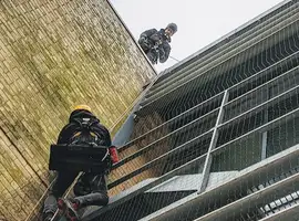 men using industrial rope access