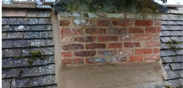 Side of repaired chimney